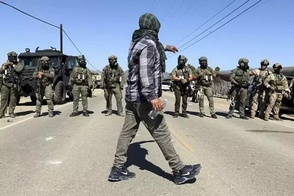 Federal Agents and Protesters Clash During Farm Raid in Southern California