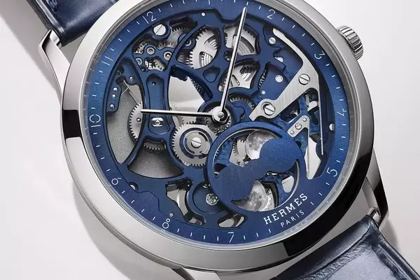 Hermès Introduces New Slim d’Hermès Squelette Lune Timepieces in Titanium and Platinum