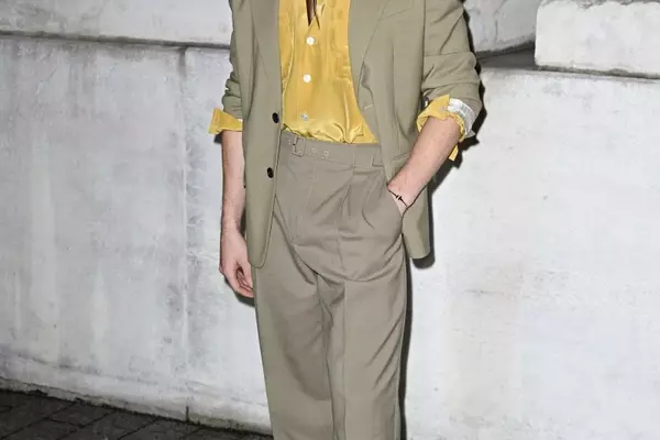 Connor Storrie's Style Evolution: Embracing the Statement Bag for SNL Debut