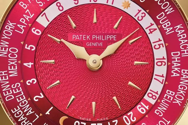 Patek Philippe Unveils New World Time 7129J-001 with Bold Carmine-Red Dial