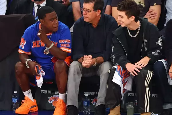 Timothée Chalamet's Courtside Comfort: Mini Uggs Take Center Stage at Knicks Game