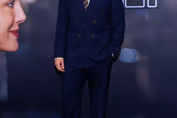 Callum Turner's Stylish Twist on the Classic Navy Suit