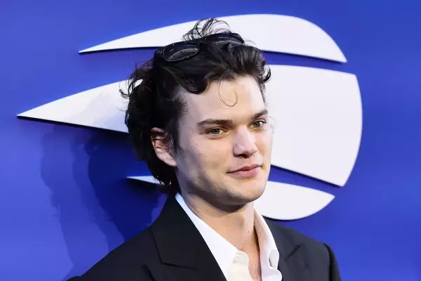 Homer Gere Embraces the Forehead Curl Trend