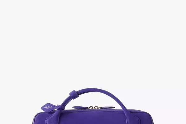 Fashion Week's Defining Trends: Purple Hues, Statement Brooches, and Inventive Styling