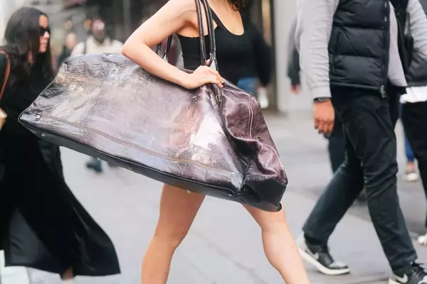 Rosalía's Bold Fashion Choices: Oversized Bags and Unique Ballet Platforms